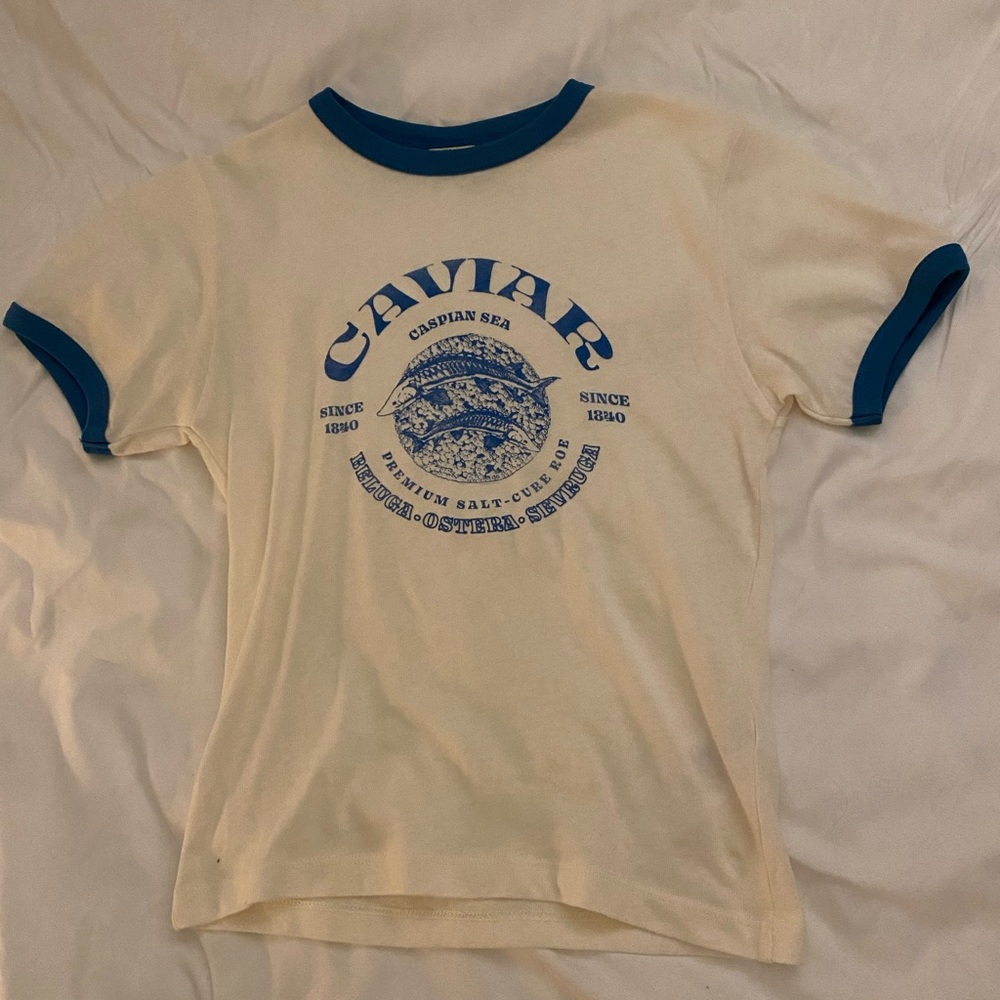 Urban Outfitters, Size Medium, Cream & blue “caviar” t shirt